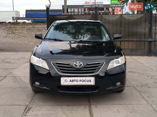Черный Тойота Камри, объемом двигателя 2.4 л и пробегом 304 тыс. км за 6990 $, фото 1 на Automoto.ua