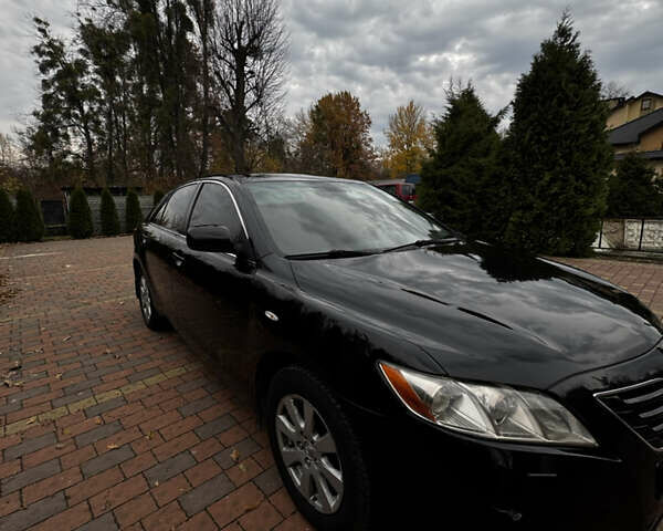 Черный Тойота Камри, объемом двигателя 2.36 л и пробегом 308 тыс. км за 7400 $, фото 6 на Automoto.ua