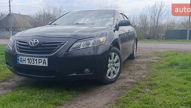 Чорний Тойота Камрі, об'ємом двигуна 2.4 л та пробігом 270 тис. км за 8500 $, фото 1 на Automoto.ua