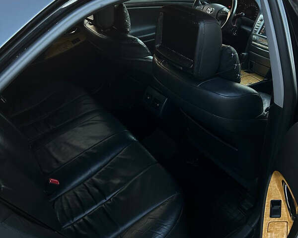 Черный Тойота Камри, объемом двигателя 2.36 л и пробегом 350 тыс. км за 6700 $, фото 9 на Automoto.ua