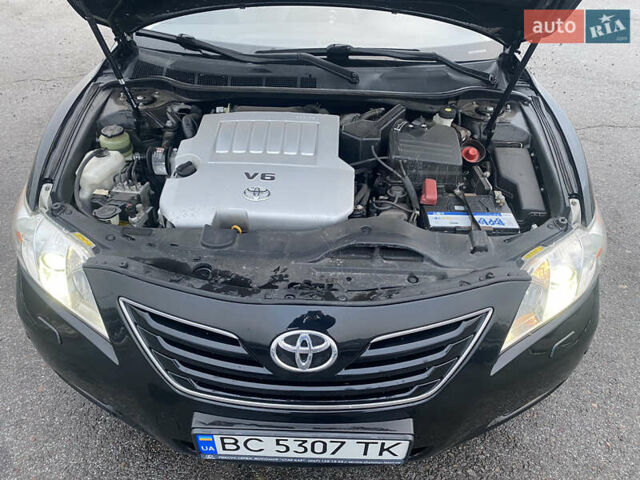 Черный Тойота Камри, объемом двигателя 3.5 л и пробегом 252 тыс. км за 10200 $, фото 28 на Automoto.ua