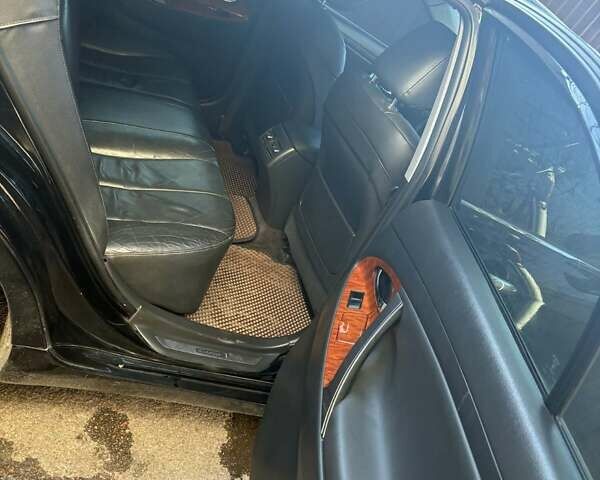 Чорний Тойота Камрі, об'ємом двигуна 2.4 л та пробігом 277 тис. км за 8700 $, фото 2 на Automoto.ua