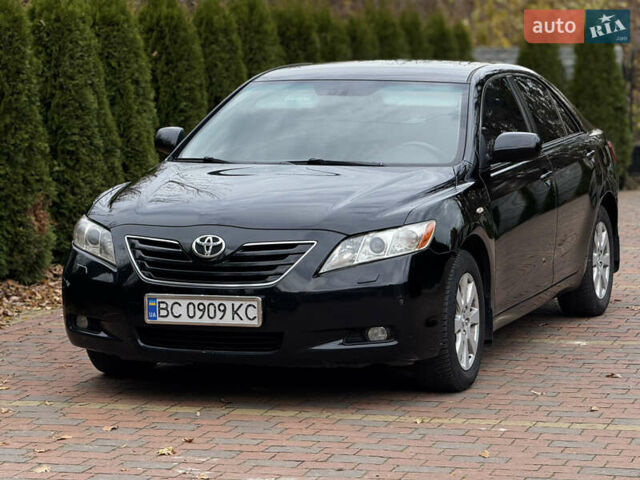 Черный Тойота Камри, объемом двигателя 2.36 л и пробегом 308 тыс. км за 7400 $, фото 1 на Automoto.ua