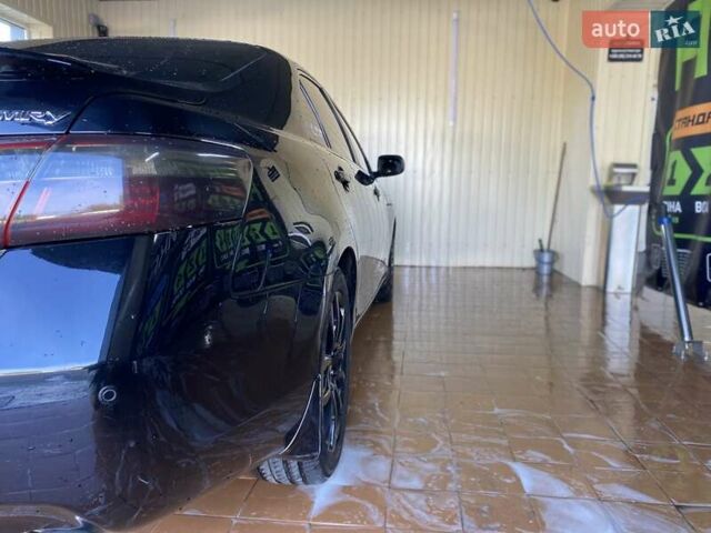 Черный Тойота Камри, объемом двигателя 3.5 л и пробегом 291 тыс. км за 10500 $, фото 4 на Automoto.ua