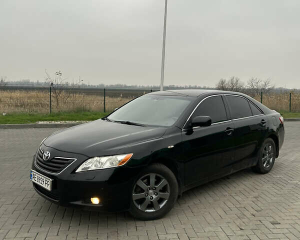 Чорний Тойота Камрі, об'ємом двигуна 2.4 л та пробігом 285 тис. км за 7800 $, фото 1 на Automoto.ua
