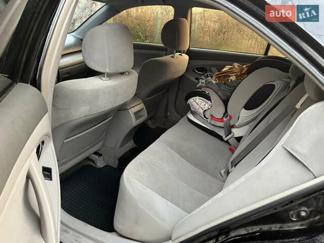 Черный Тойота Камри, объемом двигателя 2.36 л и пробегом 297 тыс. км за 8200 $, фото 11 на Automoto.ua