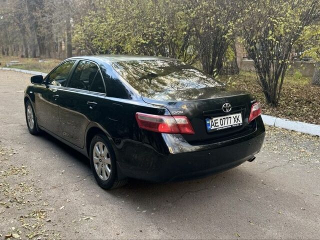 Чорний Тойота Камрі, об'ємом двигуна 2.4 л та пробігом 350 тис. км за 6399 $, фото 6 на Automoto.ua