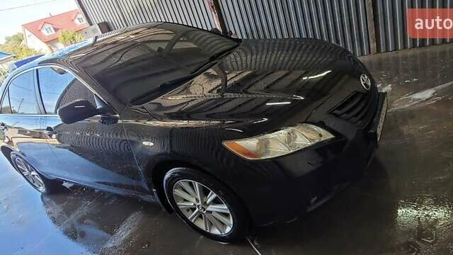 Черный Тойота Камри, объемом двигателя 3.5 л и пробегом 255 тыс. км за 11800 $, фото 17 на Automoto.ua