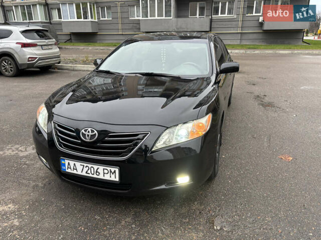 Черный Тойота Камри, объемом двигателя 3.5 л и пробегом 255 тыс. км за 9900 $, фото 1 на Automoto.ua