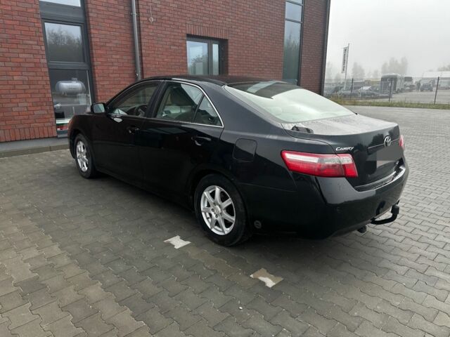Чорний Тойота Камрі, об'ємом двигуна 2.4 л та пробігом 210 тис. км за 4550 $, фото 2 на Automoto.ua
