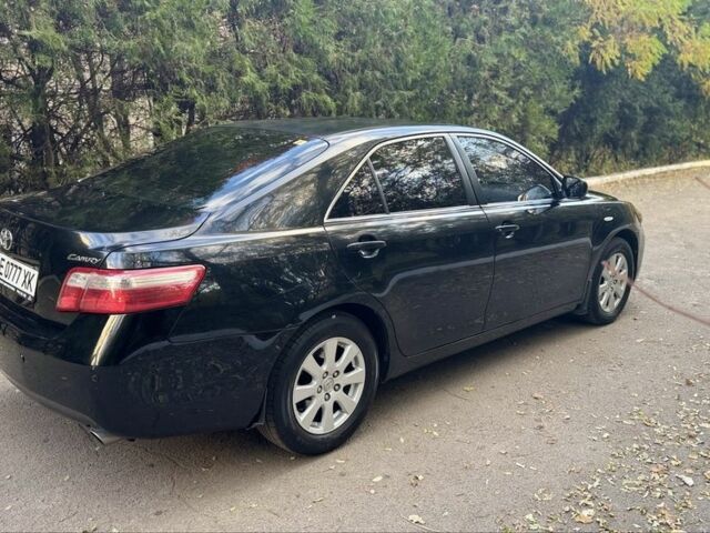 Чорний Тойота Камрі, об'ємом двигуна 2.4 л та пробігом 350 тис. км за 6399 $, фото 4 на Automoto.ua