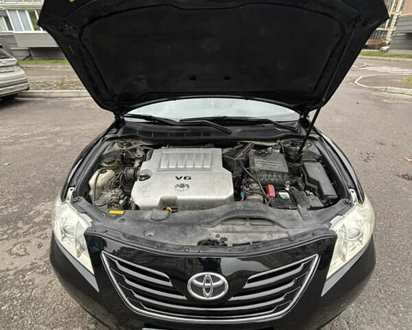 Черный Тойота Камри, объемом двигателя 3.5 л и пробегом 255 тыс. км за 9900 $, фото 28 на Automoto.ua