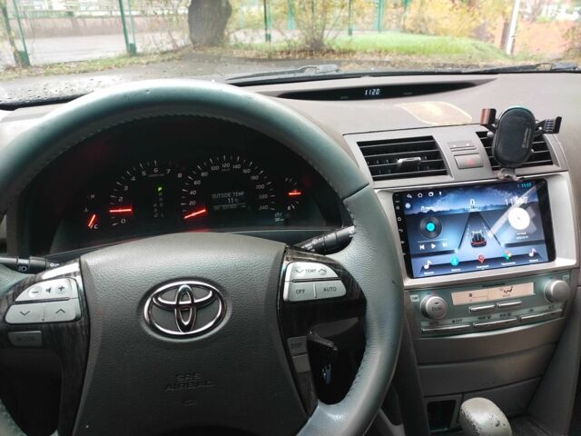 Чорний Тойота Камрі, об'ємом двигуна 2.4 л та пробігом 292 тис. км за 6995 $, фото 1 на Automoto.ua