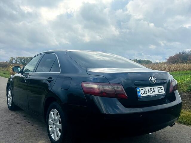 Черный Тойота Камри, объемом двигателя 2.4 л и пробегом 343 тыс. км за 8500 $, фото 2 на Automoto.ua