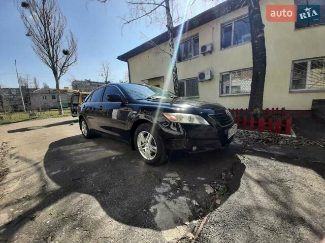 Черный Тойота Камри, объемом двигателя 2.4 л и пробегом 320 тыс. км за 10000 $, фото 17 на Automoto.ua