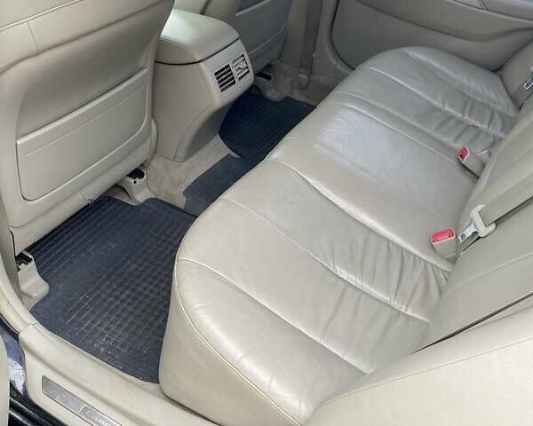 Черный Тойота Камри, объемом двигателя 2.4 л и пробегом 227 тыс. км за 8600 $, фото 7 на Automoto.ua
