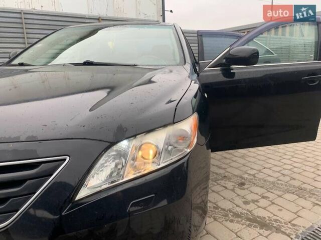 Черный Тойота Камри, объемом двигателя 2.4 л и пробегом 181 тыс. км за 9200 $, фото 6 на Automoto.ua