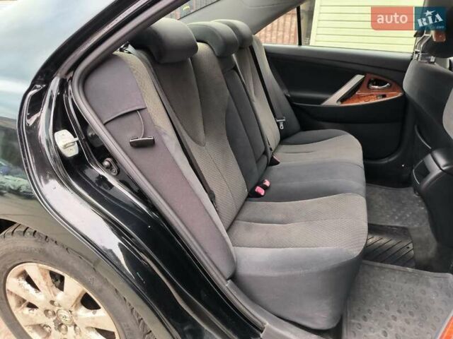 Черный Тойота Камри, объемом двигателя 2.4 л и пробегом 304 тыс. км за 6990 $, фото 10 на Automoto.ua