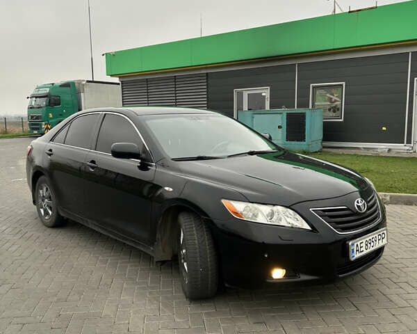 Чорний Тойота Камрі, об'ємом двигуна 2.4 л та пробігом 285 тис. км за 7800 $, фото 7 на Automoto.ua