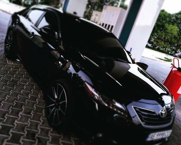 Черный Тойота Камри, объемом двигателя 3.5 л и пробегом 260 тыс. км за 12000 $, фото 1 на Automoto.ua