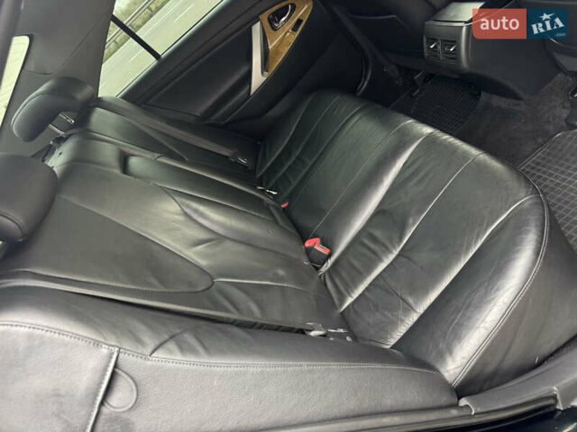 Черный Тойота Камри, объемом двигателя 2.4 л и пробегом 192 тыс. км за 10500 $, фото 19 на Automoto.ua