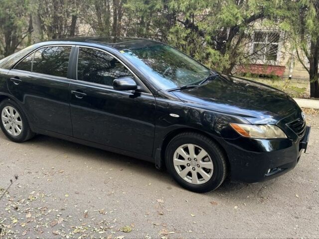 Чорний Тойота Камрі, об'ємом двигуна 2.4 л та пробігом 350 тис. км за 6399 $, фото 3 на Automoto.ua