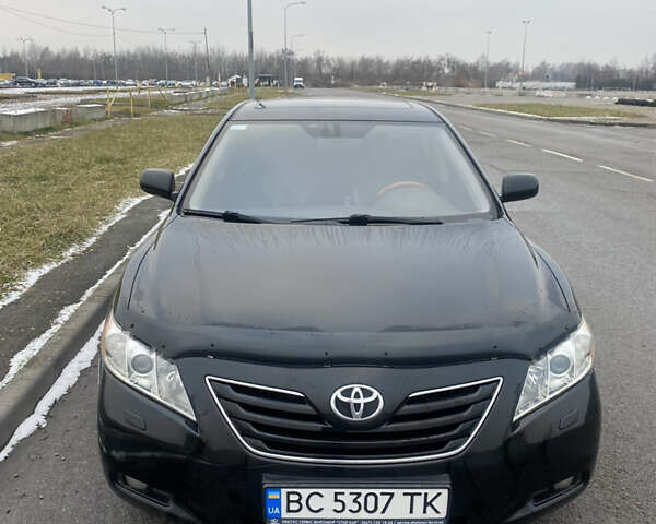 Черный Тойота Камри, объемом двигателя 3.5 л и пробегом 252 тыс. км за 10200 $, фото 1 на Automoto.ua