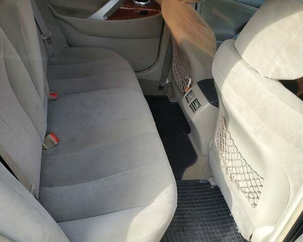 Черный Тойота Камри, объемом двигателя 2.36 л и пробегом 280 тыс. км за 6900 $, фото 1 на Automoto.ua