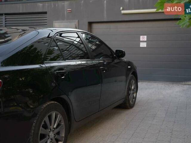 Черный Тойота Камри, объемом двигателя 3.5 л и пробегом 238 тыс. км за 10500 $, фото 2 на Automoto.ua