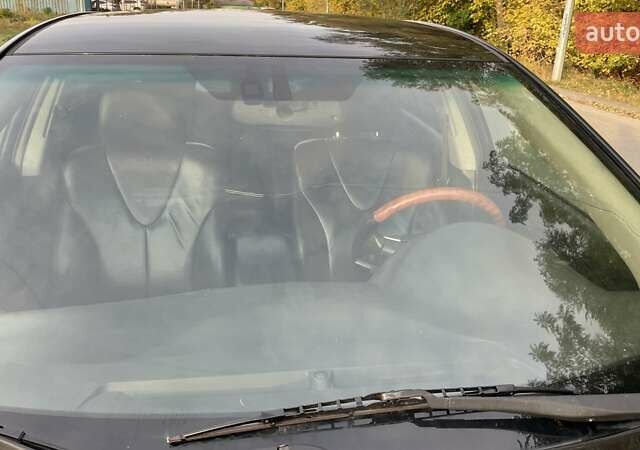 Черный Тойота Камри, объемом двигателя 2.36 л и пробегом 190 тыс. км за 8000 $, фото 12 на Automoto.ua