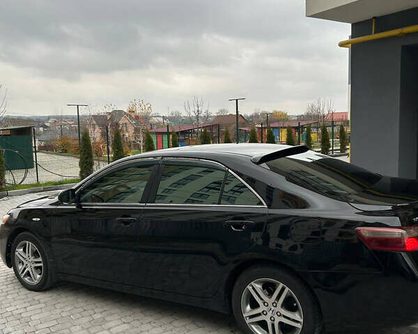Черный Тойота Камри, объемом двигателя 2.36 л и пробегом 350 тыс. км за 6700 $, фото 6 на Automoto.ua