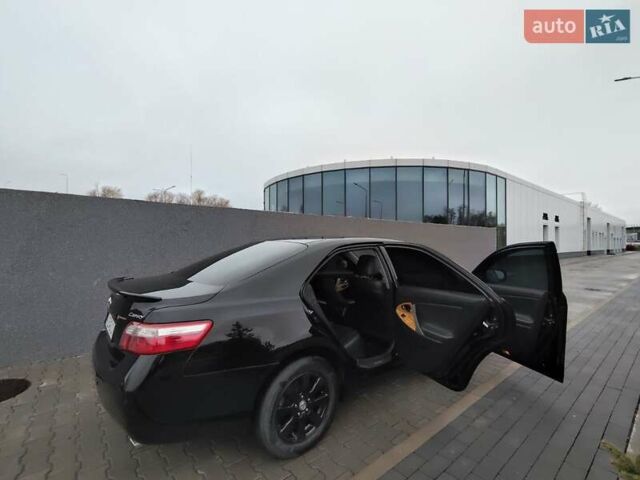 Черный Тойота Камри, объемом двигателя 2.36 л и пробегом 172 тыс. км за 11100 $, фото 4 на Automoto.ua