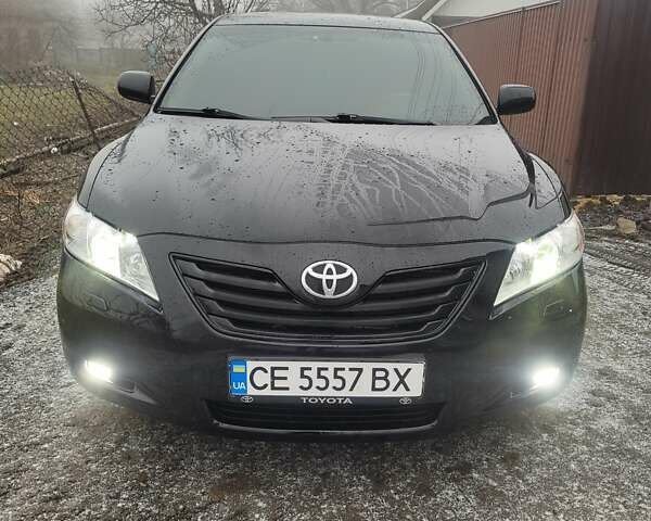 Черный Тойота Камри, объемом двигателя 3.5 л и пробегом 255 тыс. км за 11800 $, фото 23 на Automoto.ua