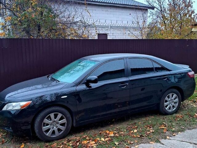 Чорний Тойота Камрі, об'ємом двигуна 2.4 л та пробігом 262 тис. км за 4750 $, фото 1 на Automoto.ua