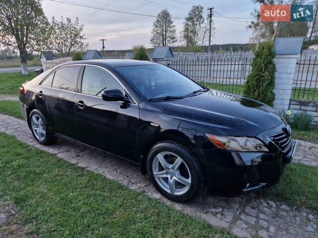 Чорний Тойота Камрі, об'ємом двигуна 2.36 л та пробігом 299 тис. км за 8888 $, фото 12 на Automoto.ua