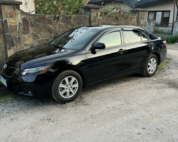 Черный Тойота Камри, объемом двигателя 2.36 л и пробегом 306 тыс. км за 7900 $, фото 2 на Automoto.ua