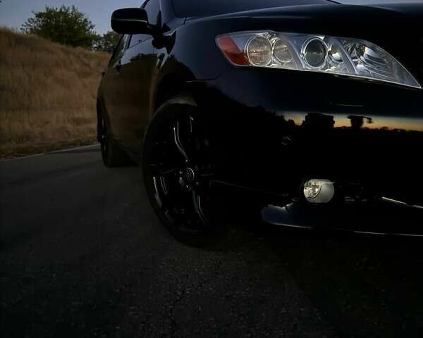 Черный Тойота Камри, объемом двигателя 3.5 л и пробегом 291 тыс. км за 10500 $, фото 9 на Automoto.ua