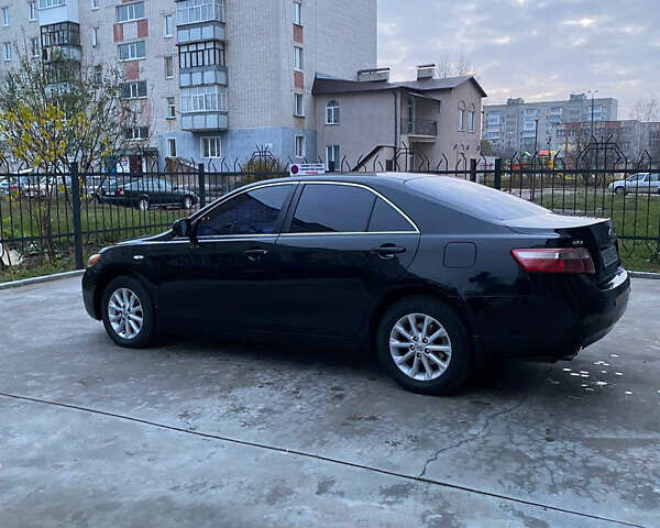 Чорний Тойота Камрі, об'ємом двигуна 3.46 л та пробігом 290 тис. км за 8500 $, фото 4 на Automoto.ua