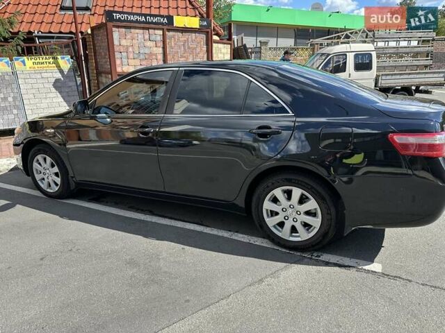 Черный Тойота Камри, объемом двигателя 2.4 л и пробегом 306 тыс. км за 10500 $, фото 2 на Automoto.ua