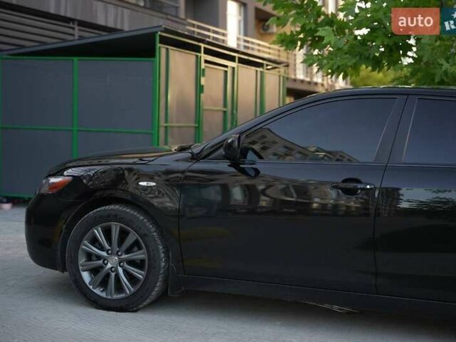 Черный Тойота Камри, объемом двигателя 3.5 л и пробегом 238 тыс. км за 10500 $, фото 5 на Automoto.ua