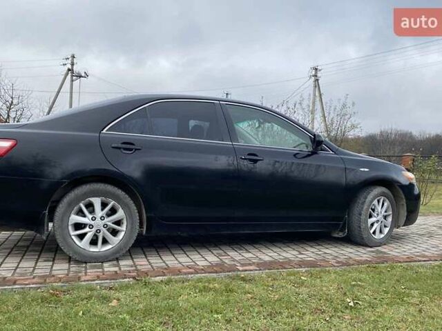 Черный Тойота Камри, объемом двигателя 2.4 л и пробегом 227 тыс. км за 8600 $, фото 11 на Automoto.ua
