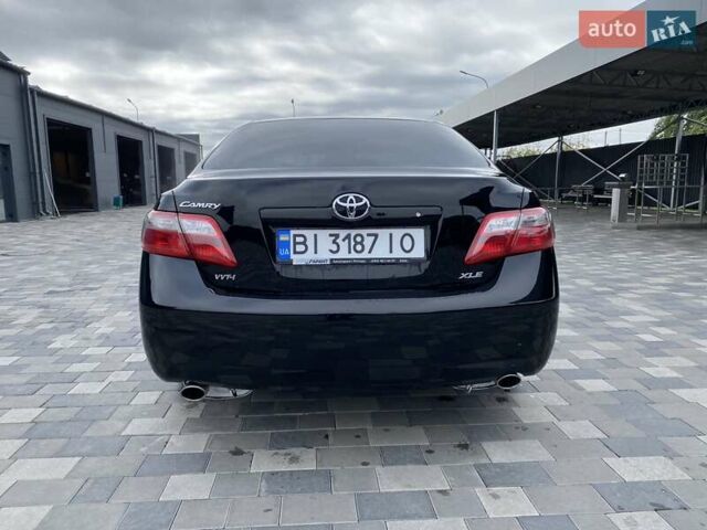 Чорний Тойота Камрі, об'ємом двигуна 3.46 л та пробігом 336 тис. км за 8900 $, фото 6 на Automoto.ua