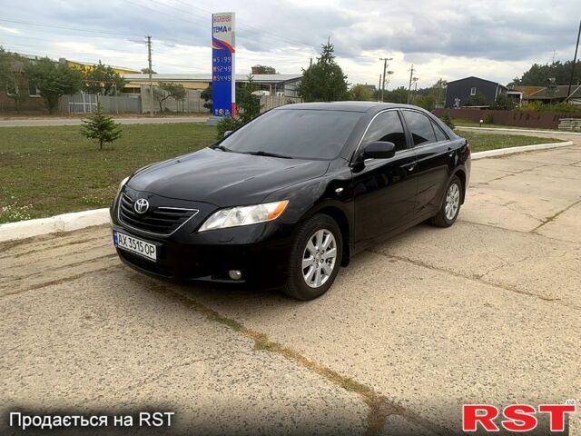 Черный Тойота Камри, объемом двигателя 3.5 л и пробегом 200 тыс. км за 10000 $, фото 1 на Automoto.ua