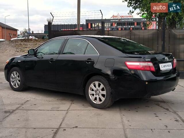 Черный Тойота Камри, объемом двигателя 2.4 л и пробегом 304 тыс. км за 6990 $, фото 4 на Automoto.ua