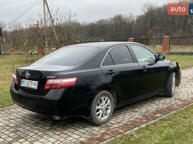 Черный Тойота Камри, объемом двигателя 2.4 л и пробегом 227 тыс. км за 8600 $, фото 1 на Automoto.ua