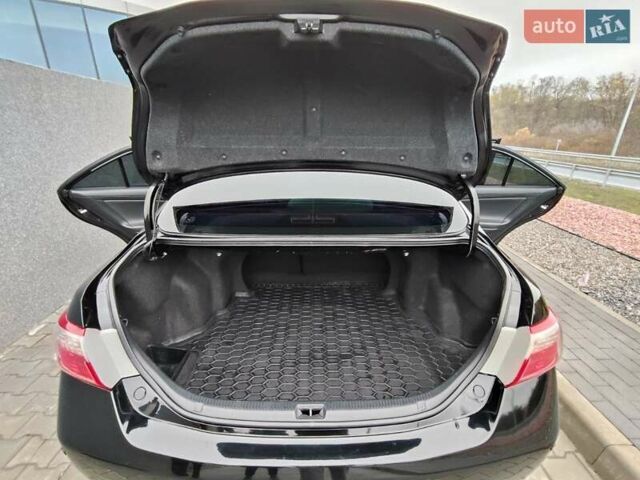 Черный Тойота Камри, объемом двигателя 2.36 л и пробегом 172 тыс. км за 11100 $, фото 12 на Automoto.ua