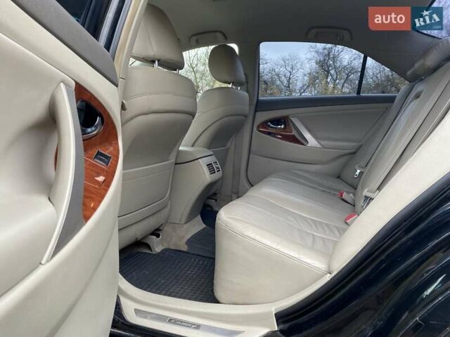 Черный Тойота Камри, объемом двигателя 2.4 л и пробегом 227 тыс. км за 8600 $, фото 17 на Automoto.ua