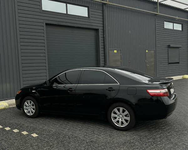 Черный Тойота Камри, объемом двигателя 2.36 л и пробегом 270 тыс. км за 7200 $, фото 6 на Automoto.ua