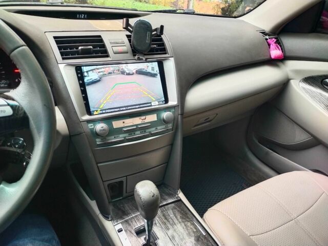 Чорний Тойота Камрі, об'ємом двигуна 2.4 л та пробігом 292 тис. км за 6995 $, фото 2 на Automoto.ua