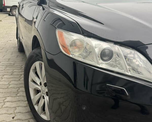 Чорний Тойота Камрі, об'ємом двигуна 2.36 л та пробігом 302 тис. км за 8500 $, фото 8 на Automoto.ua